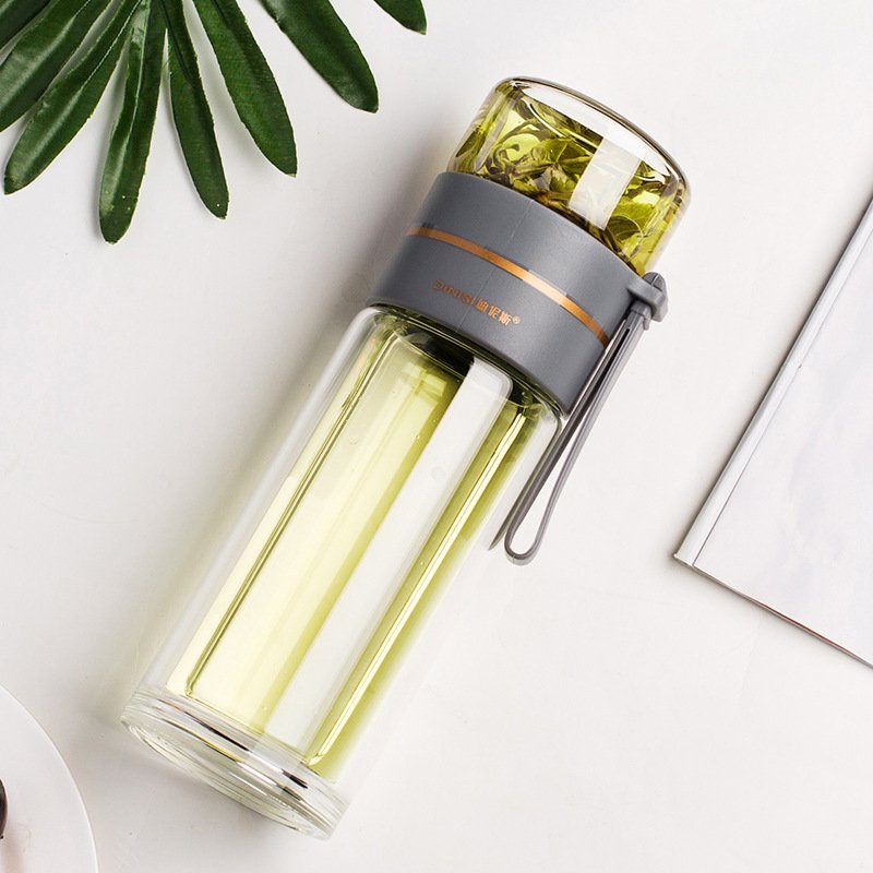 Close-up of the Glass Tea Bottle with Infuser, showcasing its sleek design and durable borosilicate glass